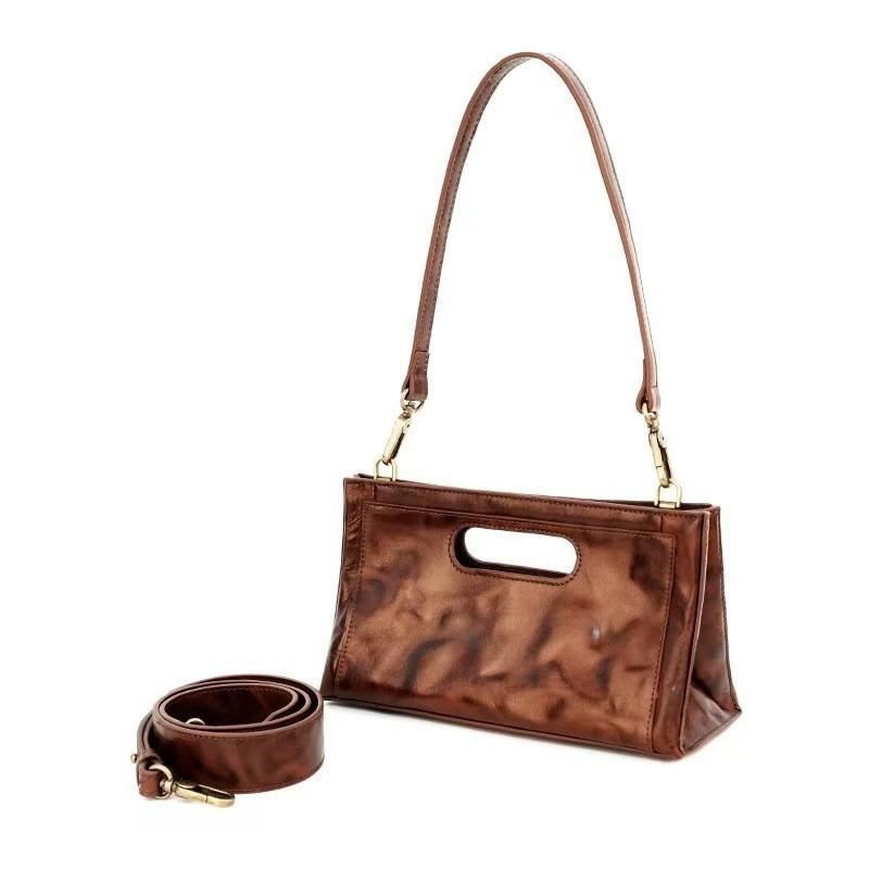 Cowhide tote bag women's new niche design chain underarm bag hand grab pleated pattern versatile shoulder bag