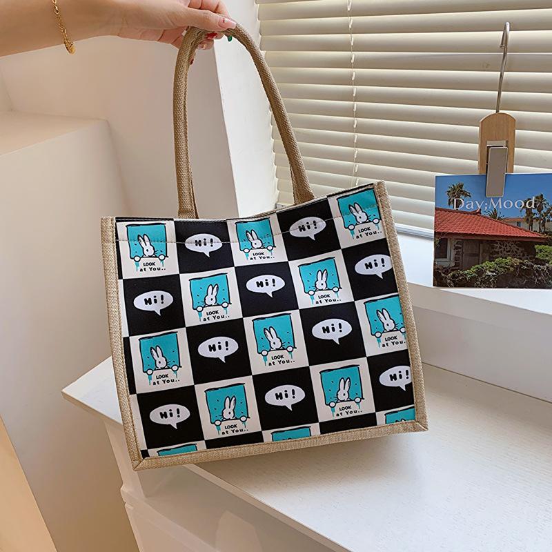 New Printed Large Capacity Fashionable Commuting Women's Bag for College Students In Class One-shoulder Tote Bag Handheld Cotton and Linen Bag Trend