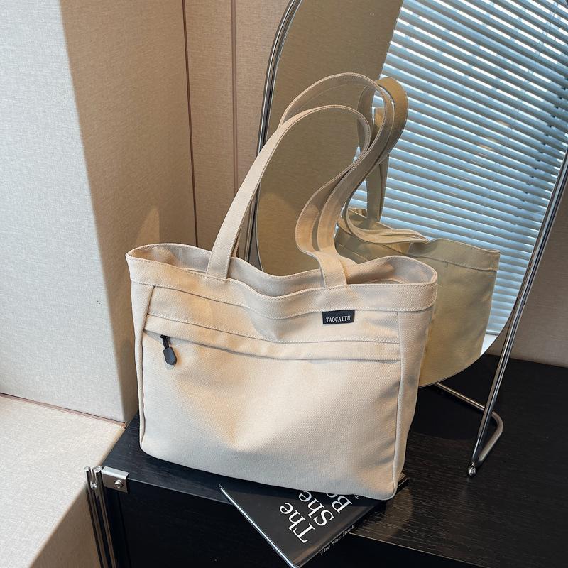 Casual large-capacity canvas bag women's new fashion versatile shoulder bag college student class bag