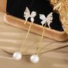 Elegant Two-Way Butterfly Pearl Tassel Earrings: Versatile, Slimming Studs for a Sweet, High-End Look.