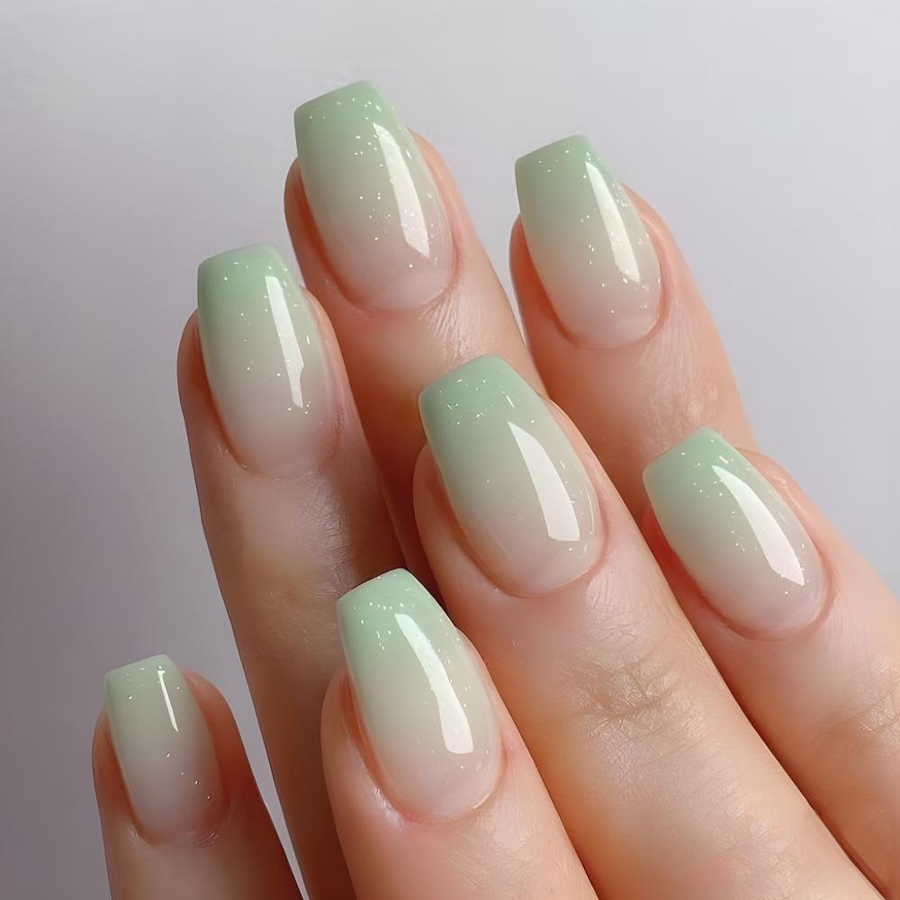 24 Stück Farbverlauf Blau Falsche Nägel Einfache Mittellange Ballett Falsche Nägel mit Katzenaugen-Design Press-on Nägel Vollabdeckung Nagelspitzen