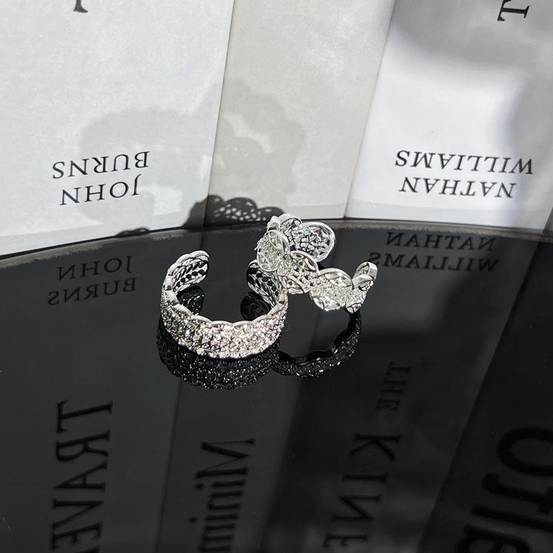 Korean Minimalist Silver-Plated Lace Hollow Coin Ring for Women - Stackable Niche Design for a Cool, Stylish Look on the Index Finger.
