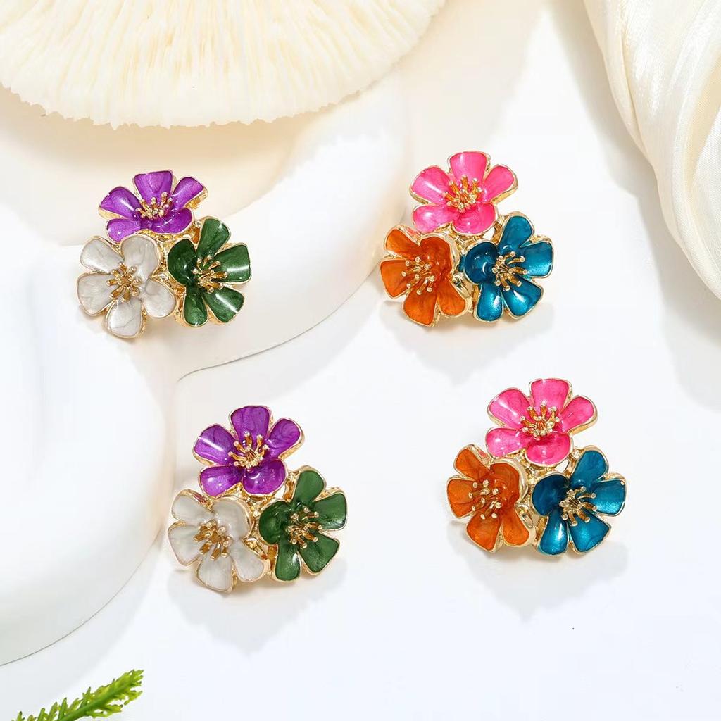 Temperament sweet metal dripping oil flower stud earrings small fresh vacation style earrings high-end earrings