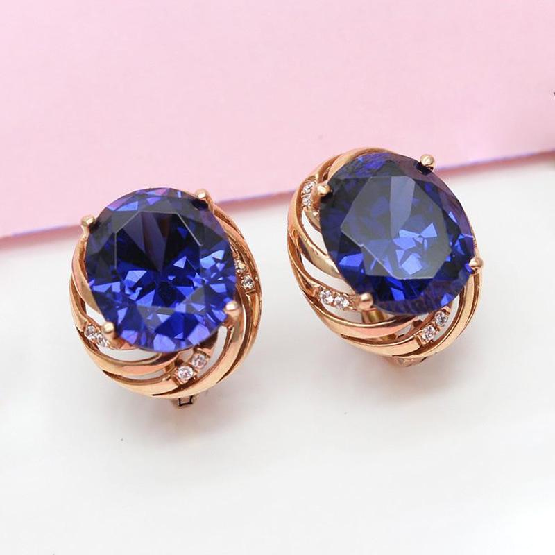 

Exquisite Russian 585 Purple Gold Round Egg Surface Pattern Earrings Temperament Trendy Atmosphere Inlaid Blue Stone Stud Earrings