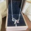 French Fairy Bow Tassel Necklace with Pink Zircon Clavicle Chain - Fashionable Light Luxury Qixi Gift