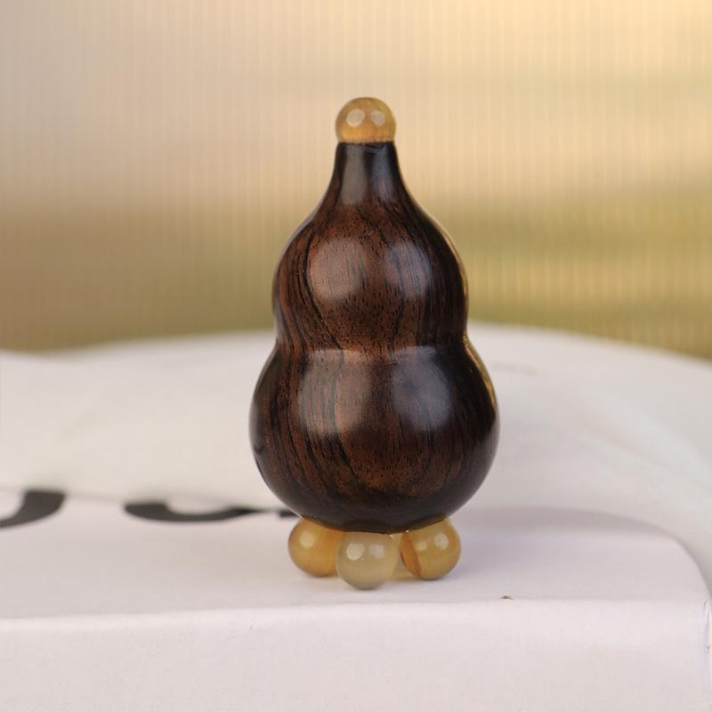 Purple Sandalwood Red Rose Gua Sha Stick: Compact Chubby Gourd Eye Massager with Small Lotus Head for Facial Massage.