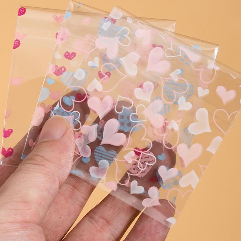 100Pcs Adhesive Treats Packaging Seal Bags Heart Decorated Clear Packaging Bags for Jewelry and Cookie Presentation