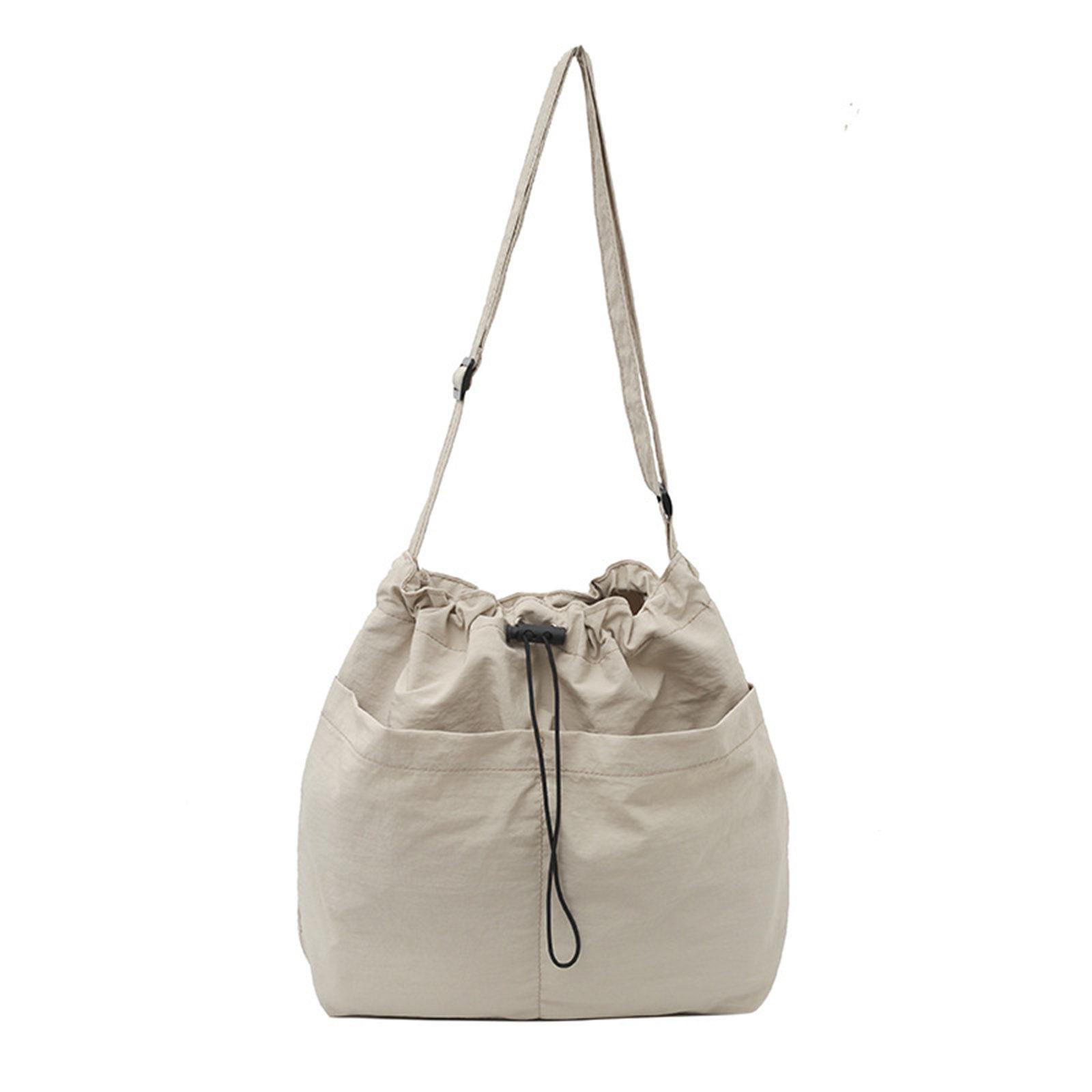 

Легкая парусиновая сумка через плечо для женщин и мужчин, большая вместимость, однотонная, на шнурках, сумка кроссбоди для повседневных путешествий разноцветный