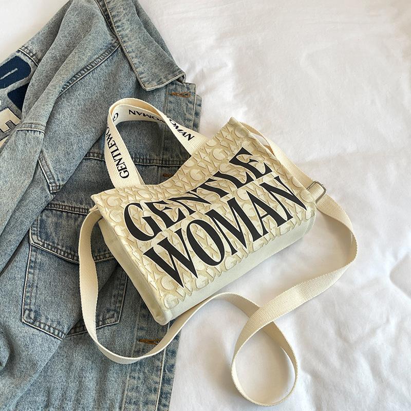 Fashion alphabet canvas shoulder bag 2025 new casual and beautiful foreign style messenger going out portable messenger small square bag