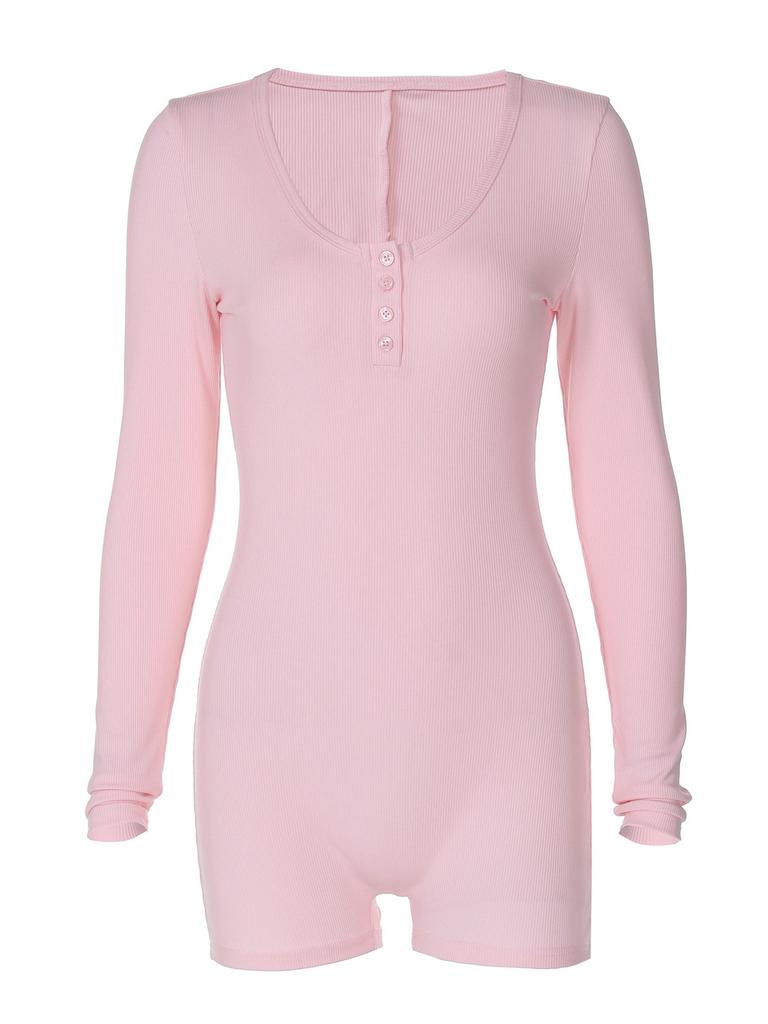 Combinaison moulante longue à manches longues taille haute rose et noire avec fermeture à boutons pour le sport