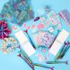 LiYiQ 110 PCS Mermaid Birthday Party Gifts Include 12 Pen 12 Notepad 12 Shiny Metallic Scrunchies 12 Gift Bag 50 Sticker Classroom Reward Gift Prizes