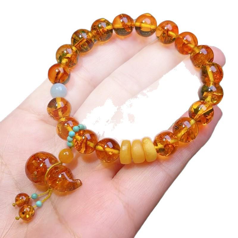 Bracelet unisexe en perles d'ambre ethnique: Design Floral, Perles Rondes en Cire d'Abeille