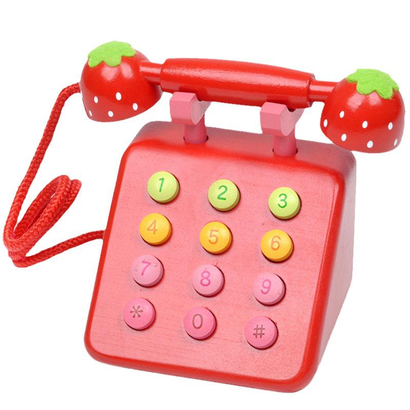 

Деревянный игровой домик клубнично-розового цвета с телефоном для детей