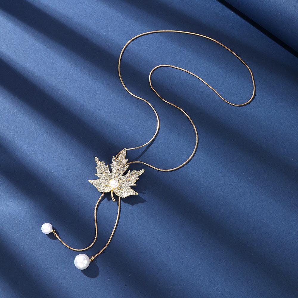 Winter hot-selling maple leaf sweater chain women's simple long necklace pendant jewelry clothes accessories