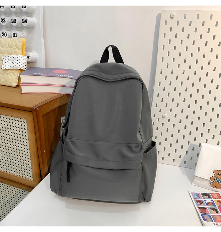 School bag new fashion solid color large capacity school bag Korean version ins versatile simple backpack casual spring outing light backpack