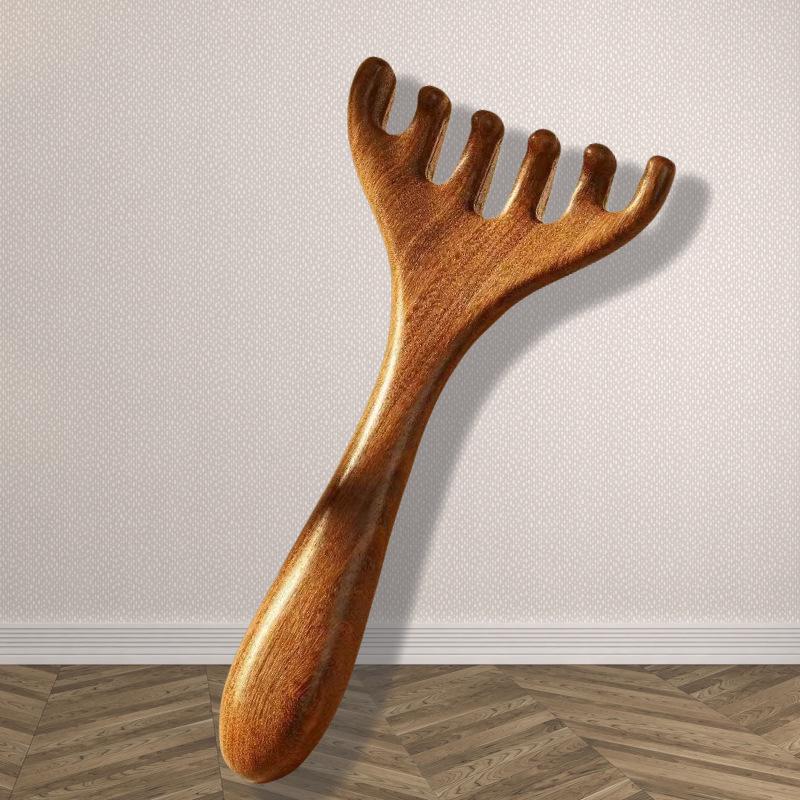 One Piece Gold Sandalwood Five-Tooth Massage Comb for Head and Meridian Stimulation.