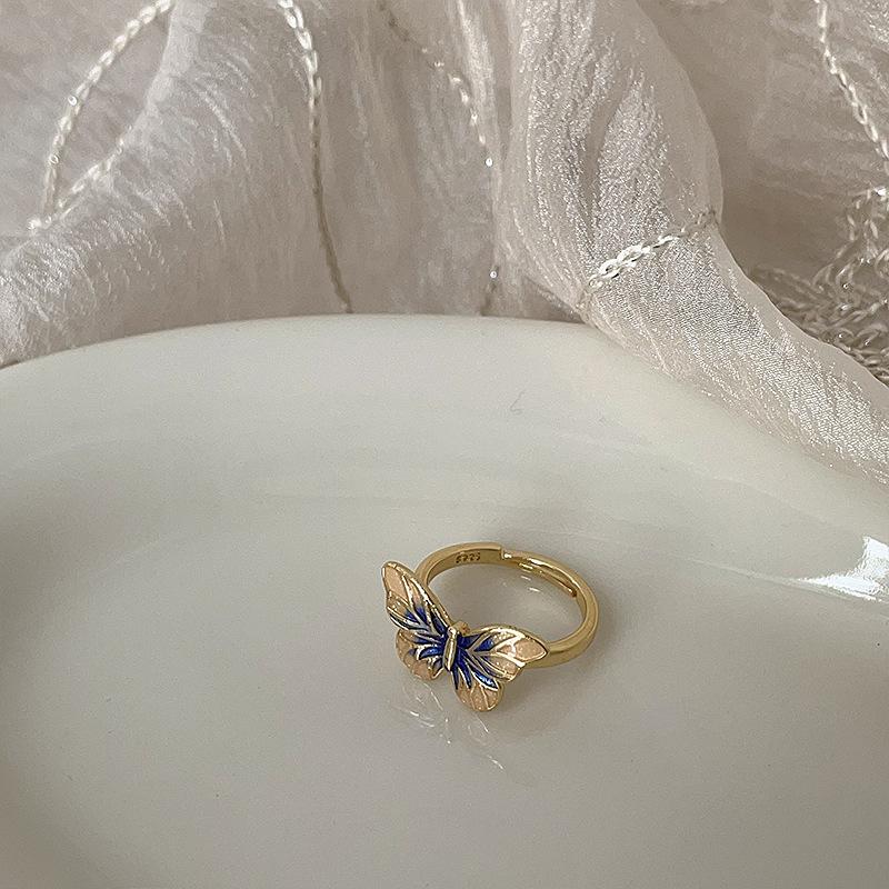 

Французское ретро-колье с бабочкой в виде капли масла, металлическое ожерелье, женский дизайн, чувство ниши, индивидуальность, простой темперамент, модные серьги, кольцо