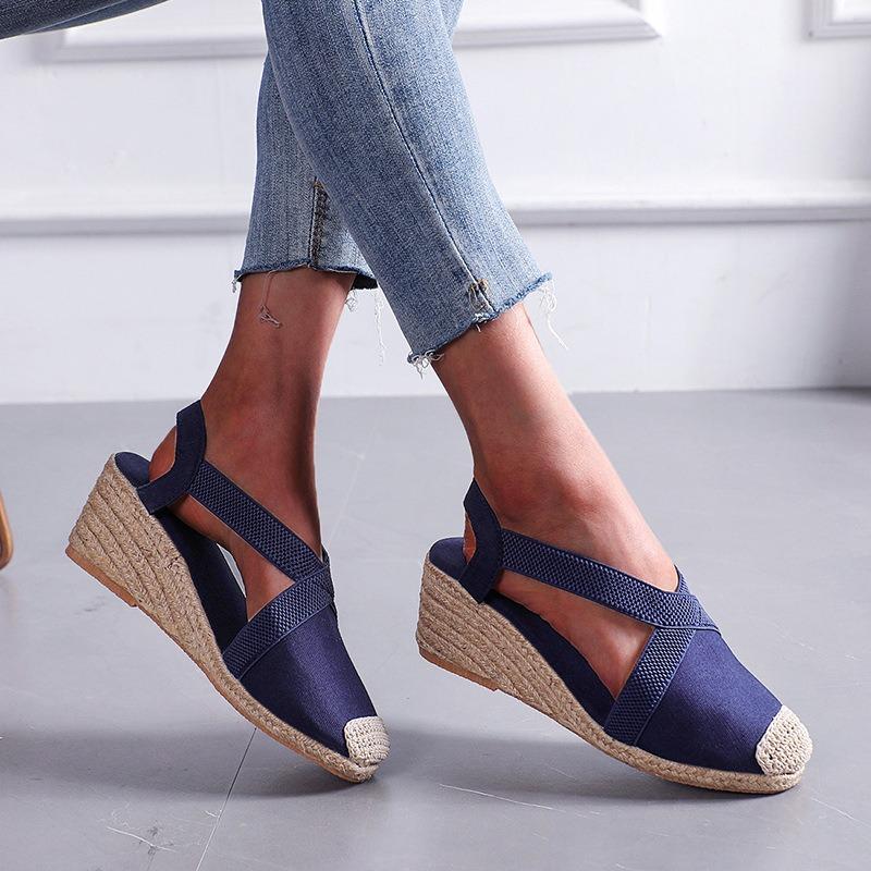 Spring and summer retro baotou straw woven wedge heel sandals cross strap platform high heel large size fisherman shoes