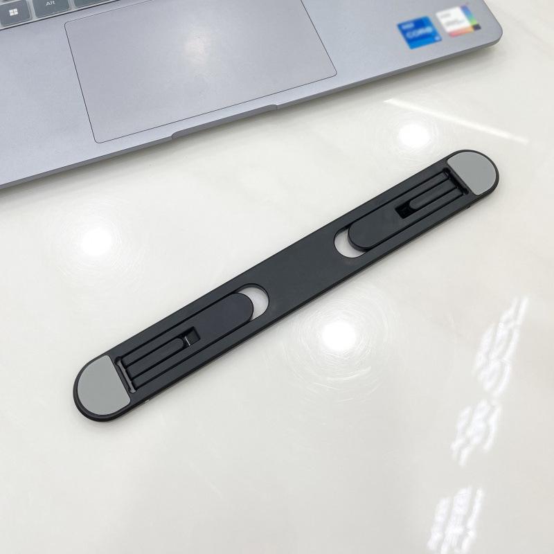 Portable Notebook Cooling Stand with Adjustable Height & Folding Design
