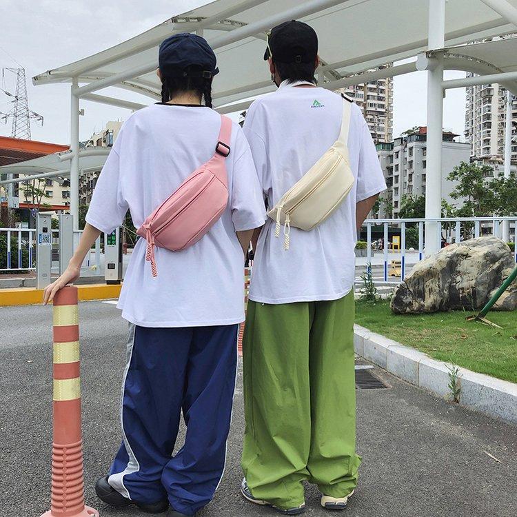 Simple messenger bag breast bag fashion casual bag women 2025 new couple bag sports versatile Japanese style fanny pack