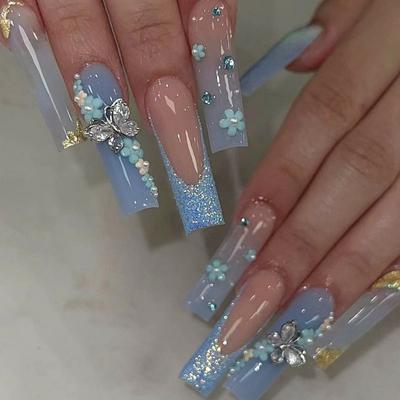 Lange blaue Press-On-Nägel mit floralem Schleifendesign Funkelnder Glitzer Süßer Cooler Stil Damen