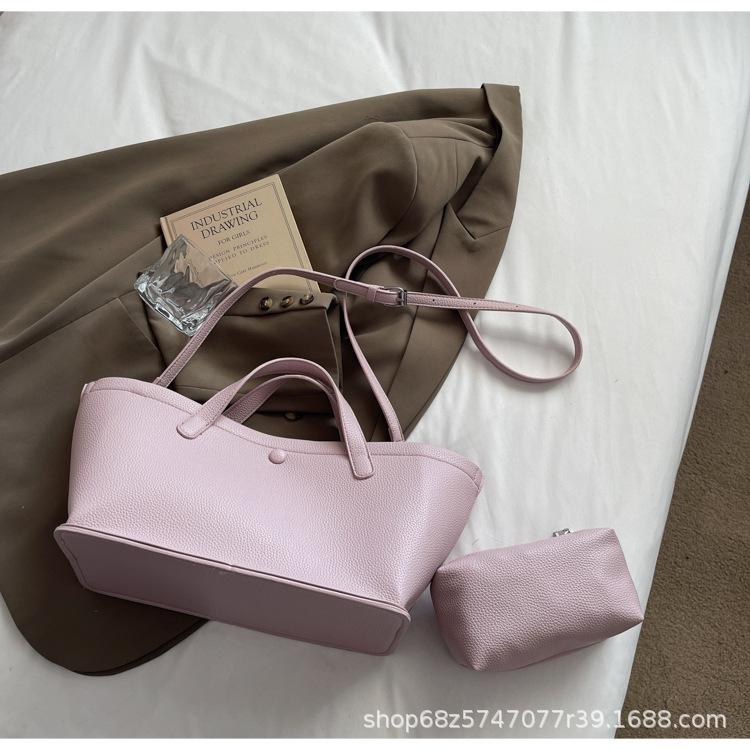 

Niche simple hand carry tote bag women s 2025 new Korean version trendy fashion shoulder bag high-end sense messenger child and mother bag