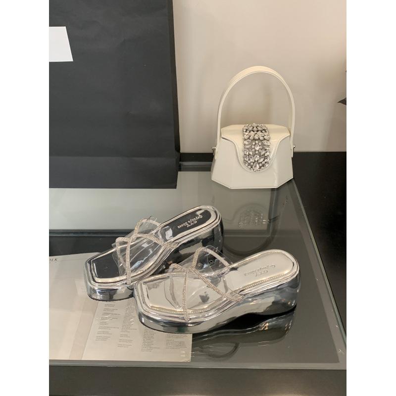 

Premium cross with rhinestone slope heel transparent one-word slippers for women to wear muffin thick-bottomed high-heeled open-toed sandals 40 серебряный