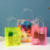 4pcs Holographic Clear Gift Bags with Handle Party Favor Bags Plastics Shopping Bags Goodie Bag Tote Bags Rainbow Holographic Gift Bag Gift Wrap Bag