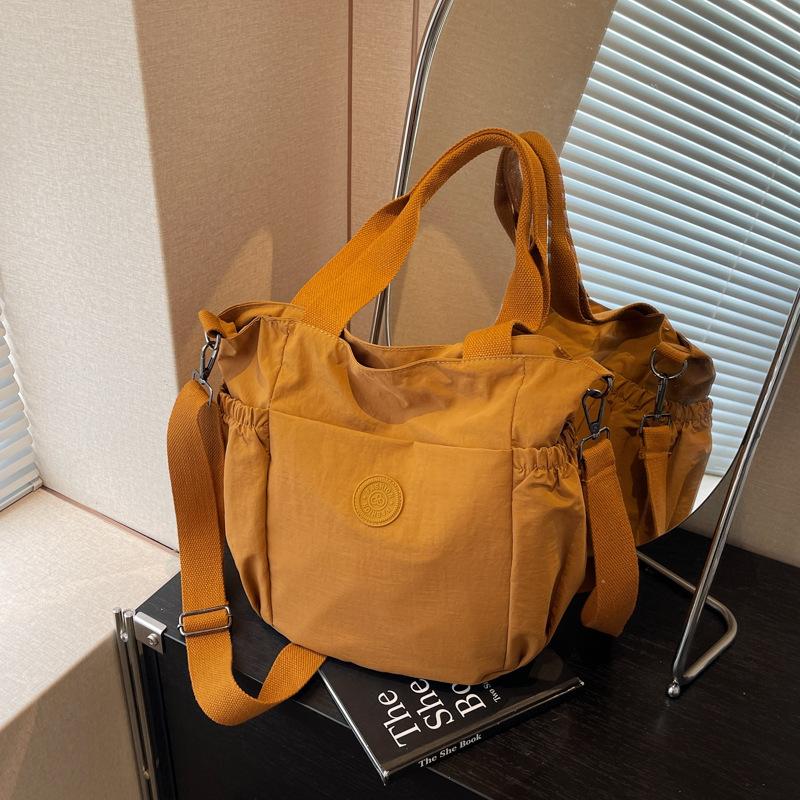 Large-capacity bag women's new spring and summer casual shoulder messenger bag texture class commuter tote bag