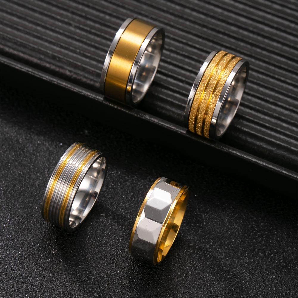 

Кольцо из нержавеющей стали Матовое золото Вращающееся Модное Хип-хоп Покрытое 18-каратным золотом Ювелирное изделие из титановой стали 9No.