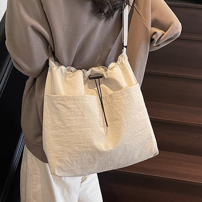Nova bolsa de verão grande capacidade com cordão para mulheres bolsa transversal japonesa casual bolsa de ombro para deslocamento na rua