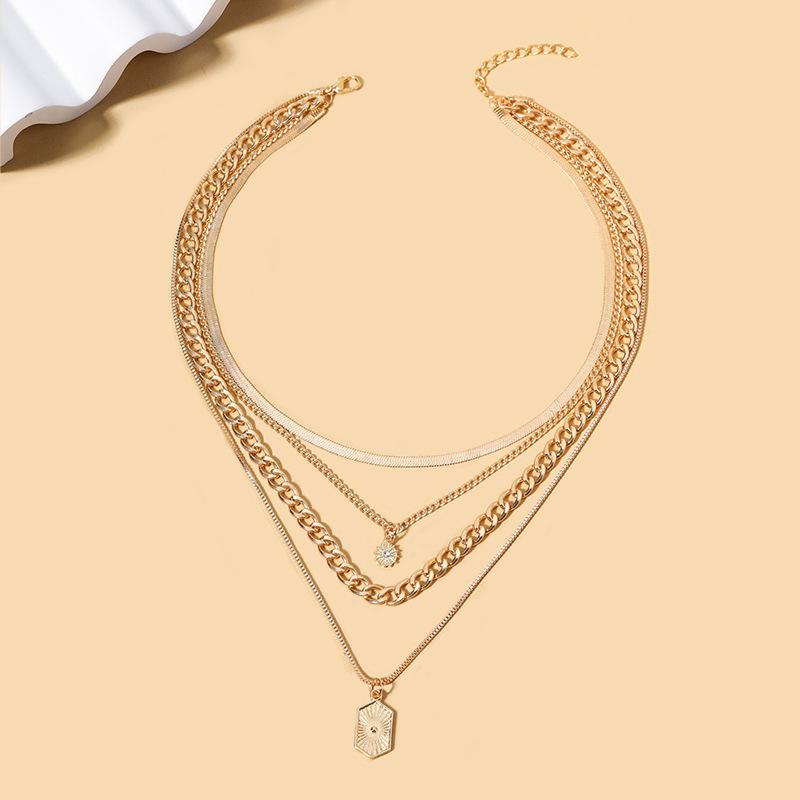 Layered Golden Zinc Alloy Necklace For Women, Cubic Zirconia Inlaid Teardrop Pendant, Multi-Strand Chain Choker Set With Textured Charms