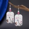 3D-gedruckte Acryl-Ohrringe mit Katzenaugen-Farbblock und Lotusblumen