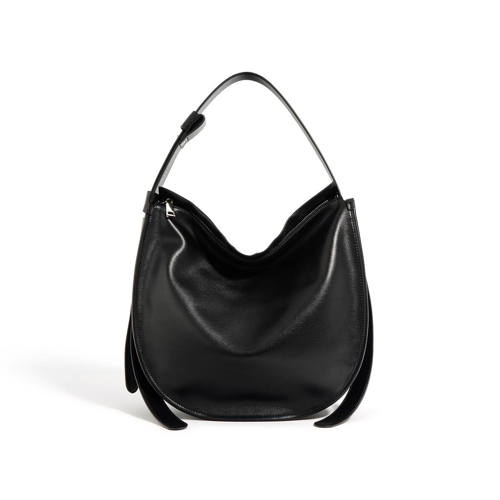 Sac cabas en cuir simple et à la mode Cuir de vachette souple Grande capacité Commuting Polyvalent Simple épaule Bandoulière Sac seau Femmes
