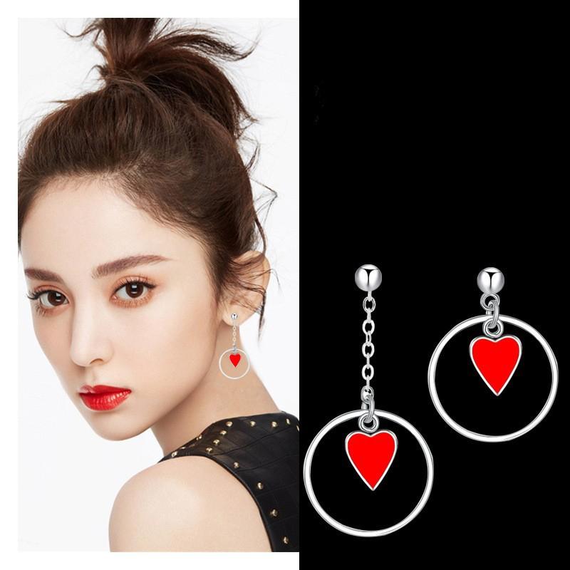 

Новый продукт Простые и модные асимметричные серьги в форме сердца Серьги в форме красного персика