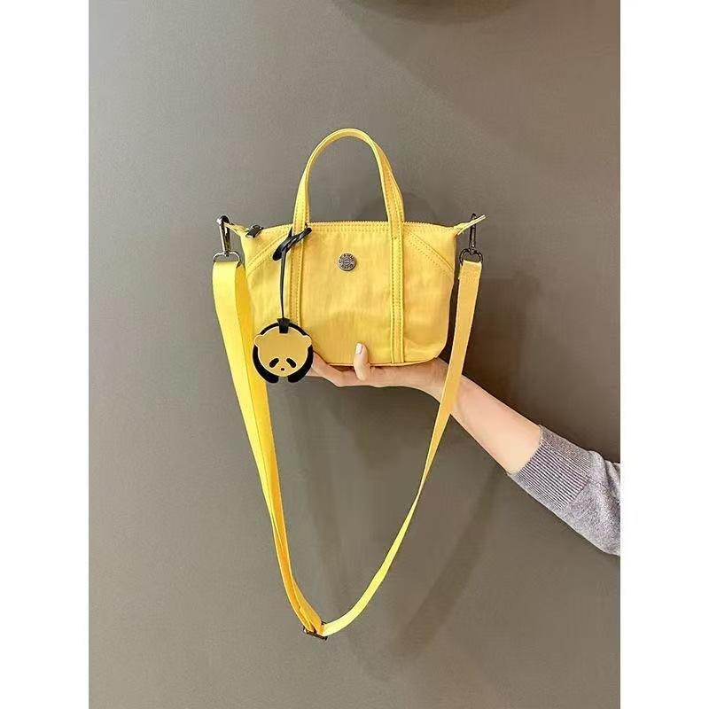 Spring and summer handbag women s 2025 new trendy high-end texture niche design casual yellow messenger dumpling bag