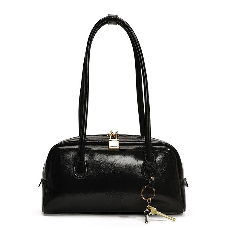 Simple retro bag women's new fashion niche shoulder armpit bag high-end commuter baguette bag