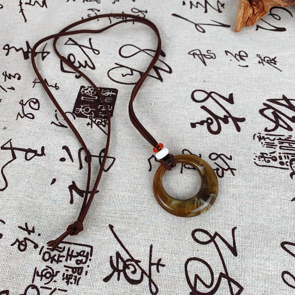 "Ethnic-Style Black Rope Ring Pendant Necklace - New Chinese Design for Autumn & Winter"