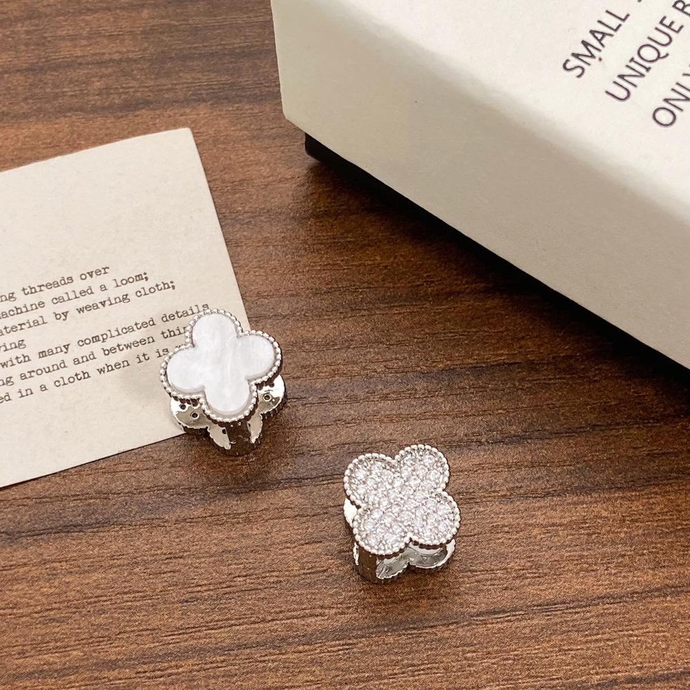 

Трендовые серьги Счастливый цветок вперед и назад Французская мода Высокая мода Серьги Четырехлистный клевер