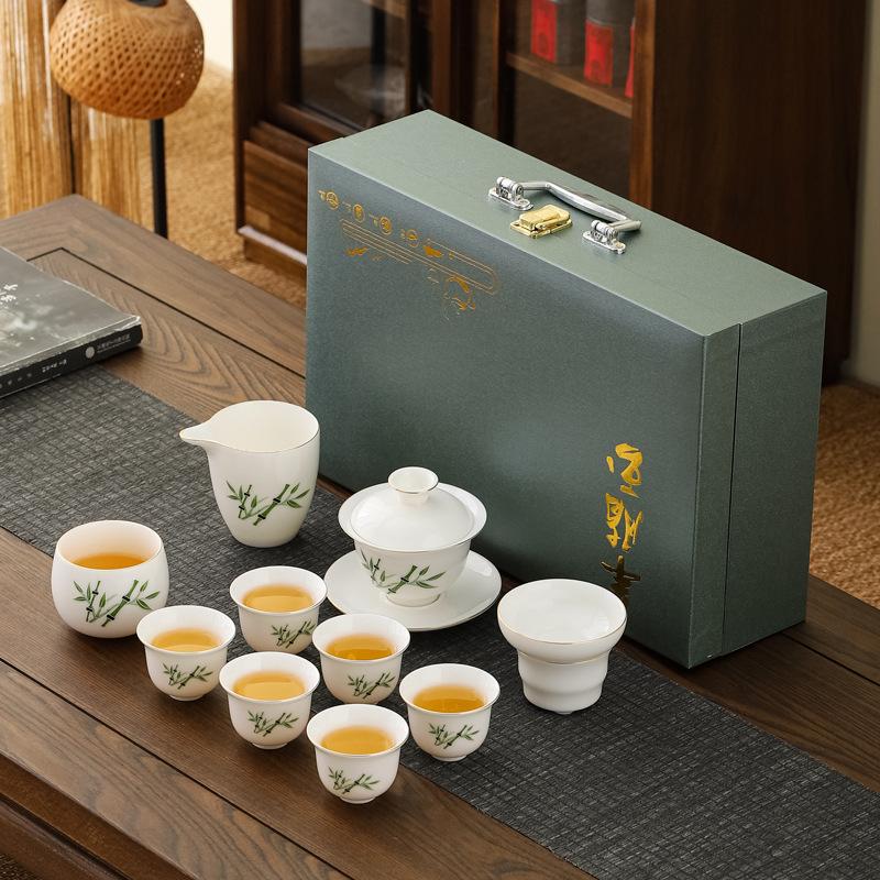 Suet jade porcelain Kung Fu tea tea set, household full set of ceramic tea cup cover bowl Dehua white porcelain tea maker