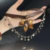 Diamond leather tiger's eye stone butterfly flower pendant necklace personalized retro light luxury neck chain niche temperament jewelry women