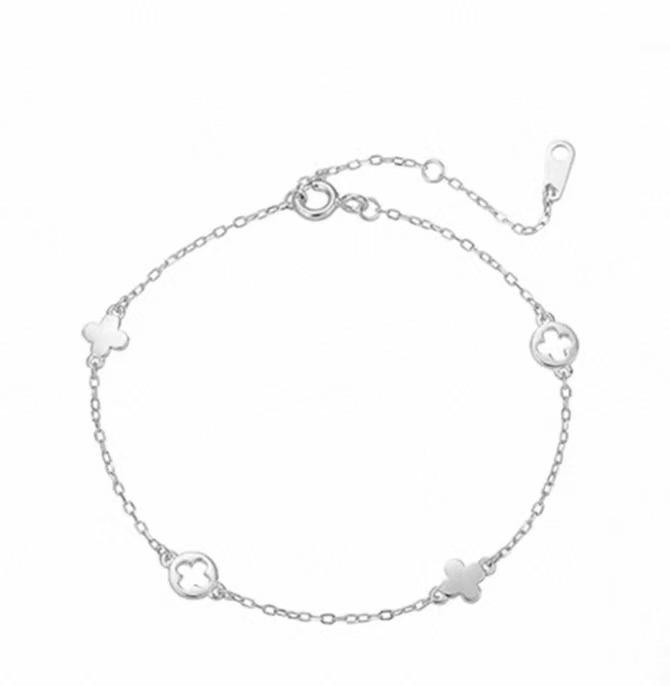 Armband med fyrklöver, pläterat med äkta guld på nysilver: Elegant, Mångsidig Design för Kvinnor