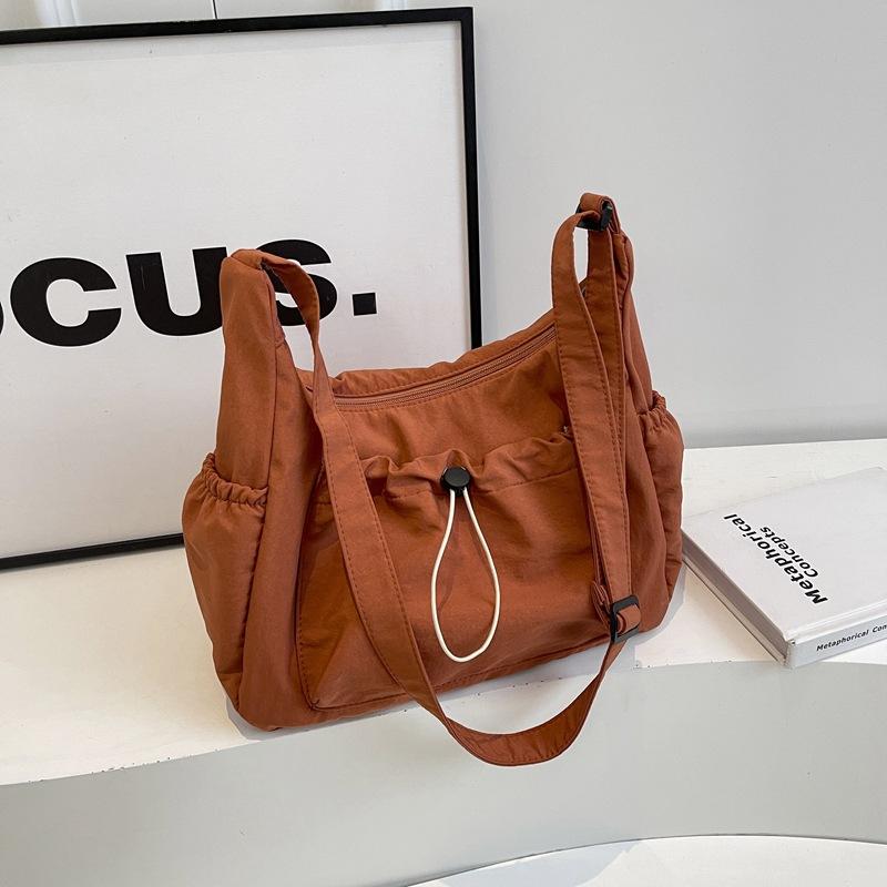 

Literary and artistic youth shoulder bag women s ins style solid color couple fashion tooling messenger bag trend niche mailman bag men оранжевый