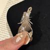 A multi-use feather brooch necklace for women, offering a light luxury and elegant high-end feel, suitable for sweaters, suits, and as a fall/winter