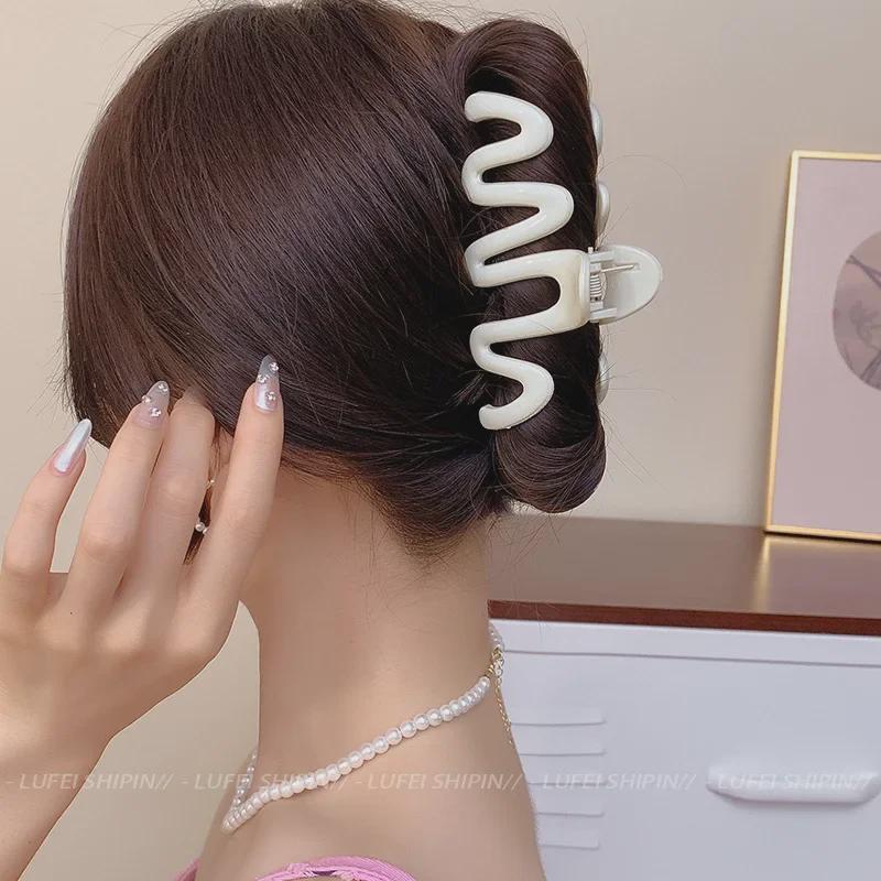 Cream Dopamine Summer Hairpin - Stylish Female Hair Shark Clip for Simple, Chic Hairstyles.