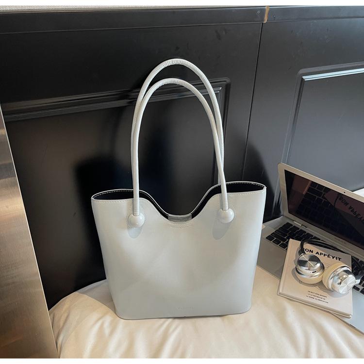 

Сумка-багет для работы, сумка под мышкой, женская простая повседневная сумка через плечо 2025 новая корейская версия моды, ощущение высокого класса, сумка для мамы и ребенка, тренд