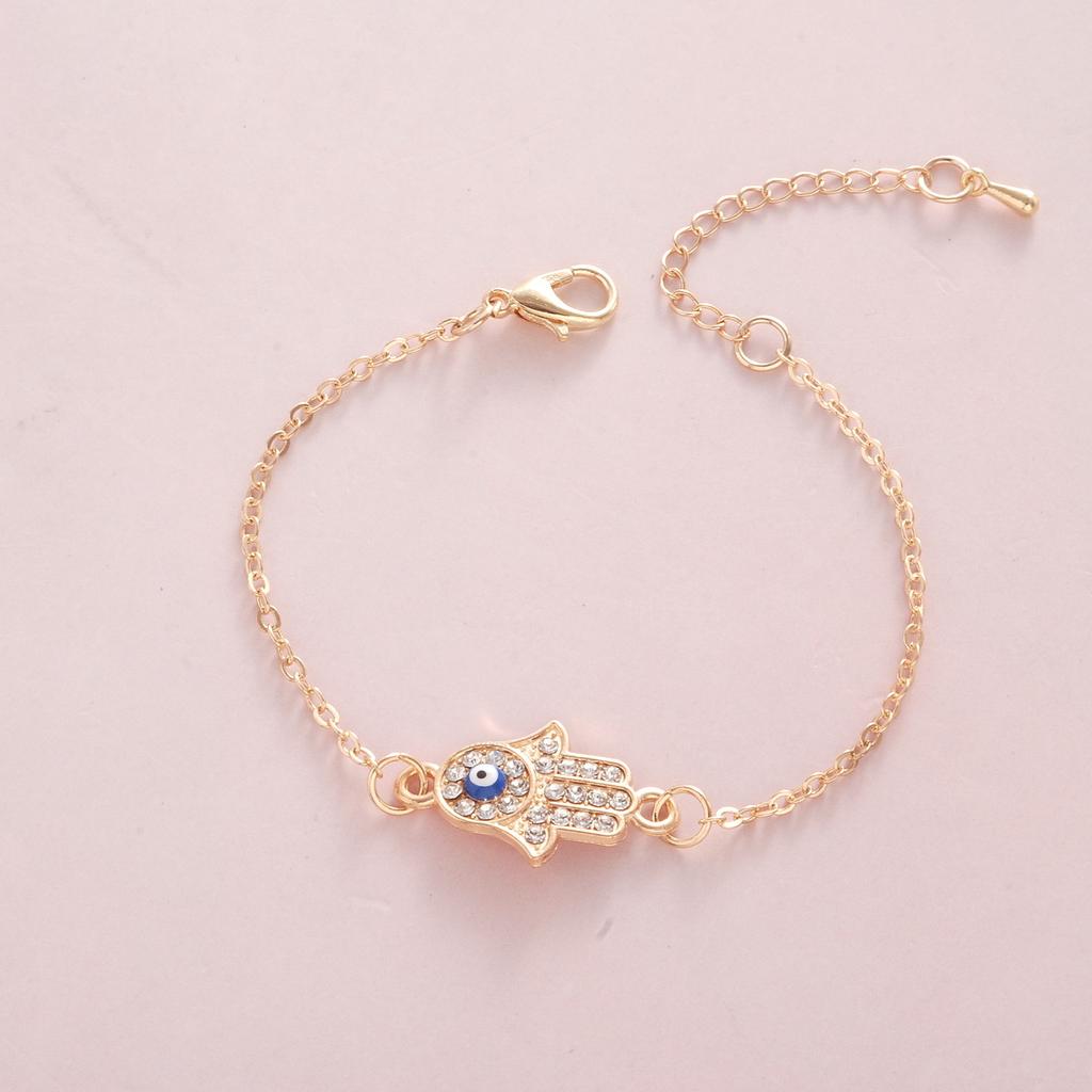 Ladies Titanium Steel Hand Shape Devil's Blue Pupil Crystal Bracelet Jewelry