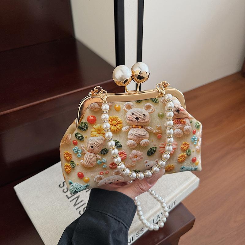 

Niche bag women s new summer versatile chain messenger bag cartoon portable gold bag бежевый