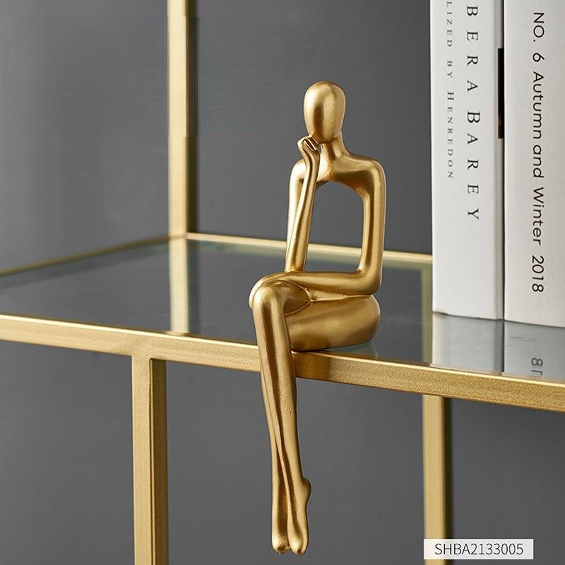 Heimdekoration, Bücherregal, Dekoration, Zubehör, abstrakte Harzstatue, goldene Miniaturen, modern