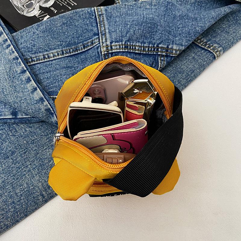 Three-color patch small bag female new dog change handbag cartoon cute student hand mobile phone bag versatile